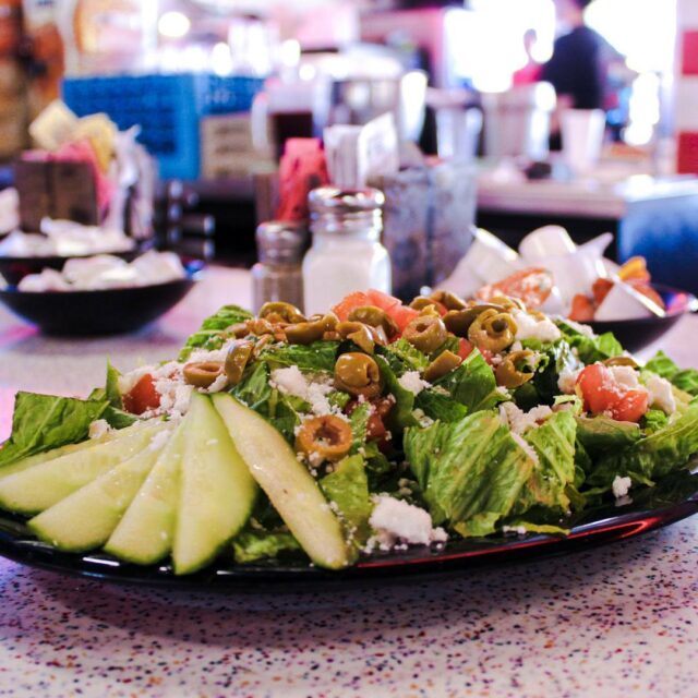 A bed of fresh romaine lettuce topped with fresh cucumber, onion, diced tomatoes, green olives, and crumbled feta cheese, all tossed together with Greek dressing to make the perfect Mediterranean Salad. 

#diner #food #lunch #restaurant #delicious #healthy #homemade #cuisine #brunch #instagood #tulsalocal #comfortfood #tulsafood #chickenfriedsandwich #americanfood #retrodiner #driveinsdinersanddives #familyownedrestaurant #tulsarestaurant #tulsafoodies #keepitlocaltulsa #dinerfood #southtulsaliving #breakfastallday #route66 #tulsasbest